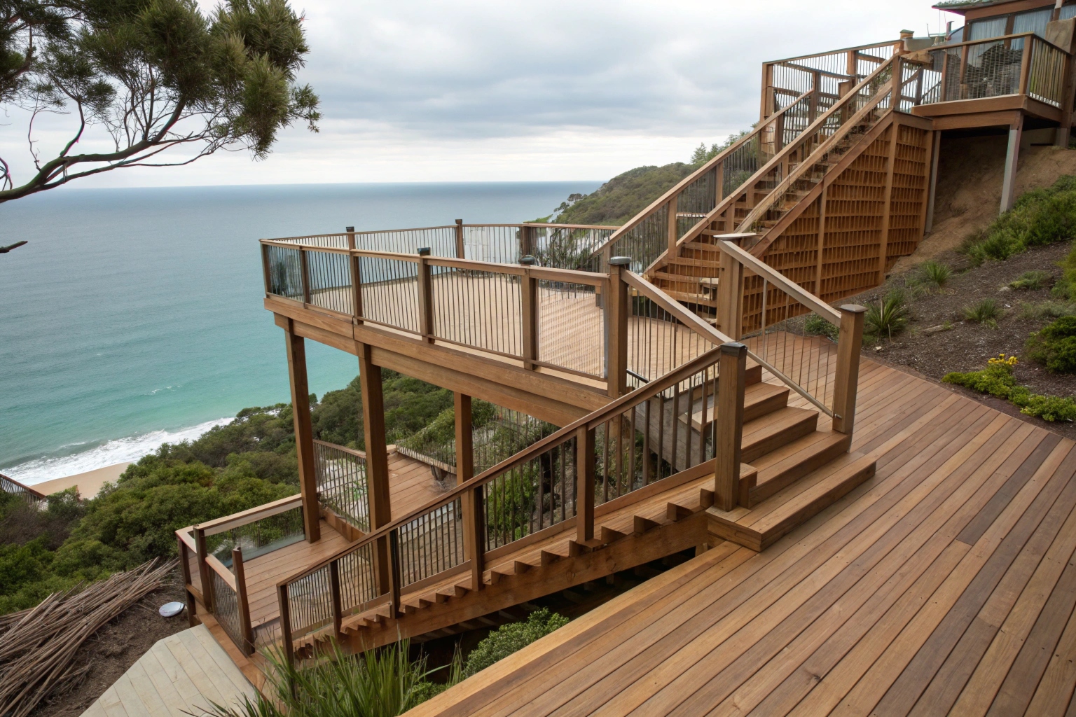 Multi-level timber deck built on a steep hillside block in Burleigh Heads with ocean views