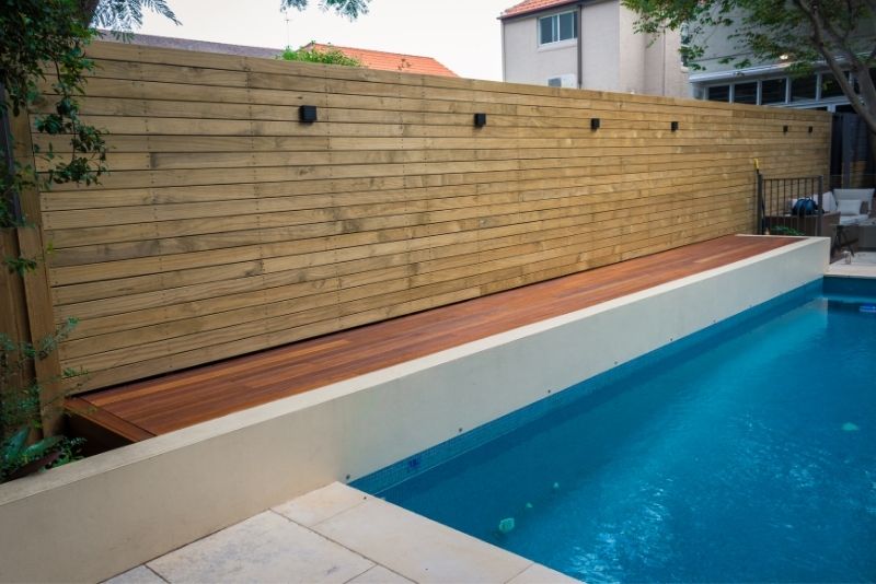 wooden deck on a pool