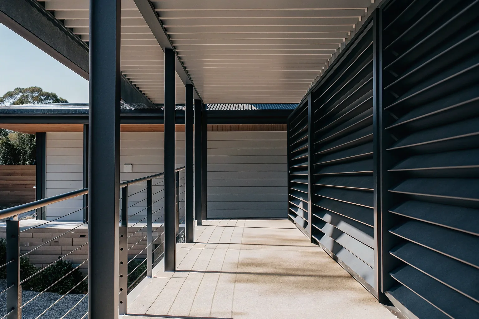 Modern contemporary verandah with powder-coated steel posts