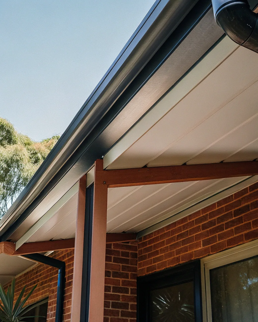 Modern insulated patio roof attached to an Australian home