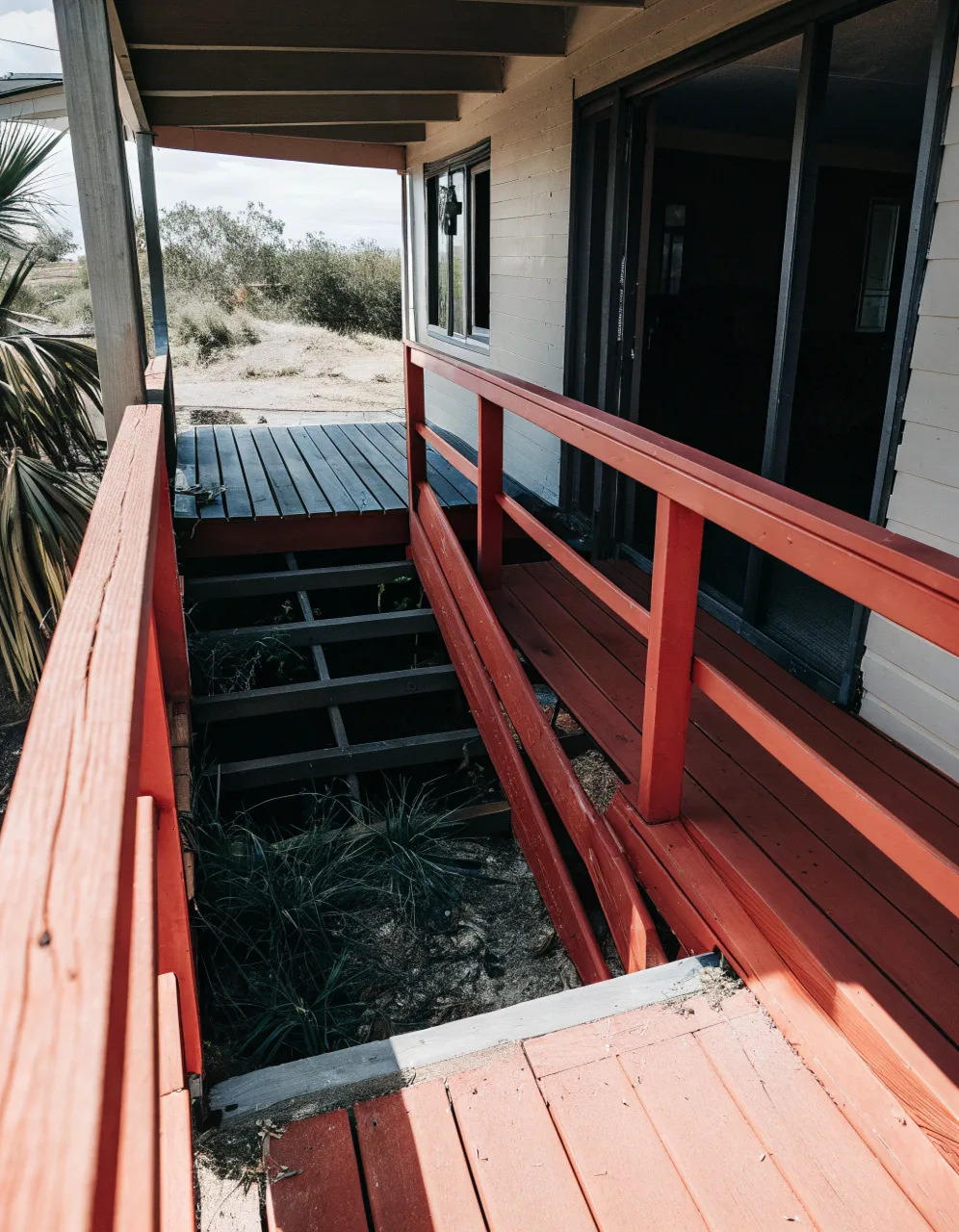 Wide angle photograph of a deteriorating timber deck